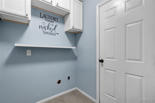 4667 Meramec Blvd, Eureka, MO 63025 - laundry room featuring electric dryer hookup, cabinet space, and baseboards