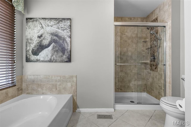 4667 Meramec Blvd, Eureka, MO 63025 - full bath with toilet, tile patterned floors, a garden tub, and a stall shower