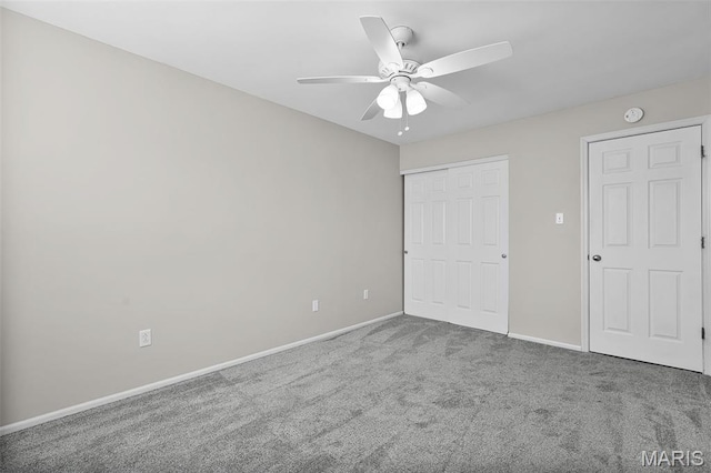 4667 Meramec Blvd, Eureka, MO 63025 - unfurnished bedroom with carpet, baseboards, a closet, and a ceiling fan