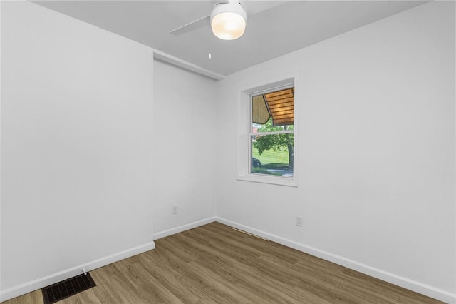 5337 Arsenal St, Saint Louis, MO 63139 - spare room featuring wood finished floors, baseboards, and ceiling fan