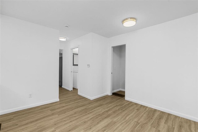 5337 Arsenal St, Saint Louis, MO 63139 - empty room featuring light wood-type flooring and baseboards