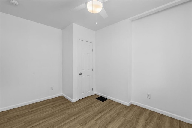 5337 Arsenal St, Saint Louis, MO 63139 - spare room with wood finished floors, baseboards, ceiling fan, and a smoke detector