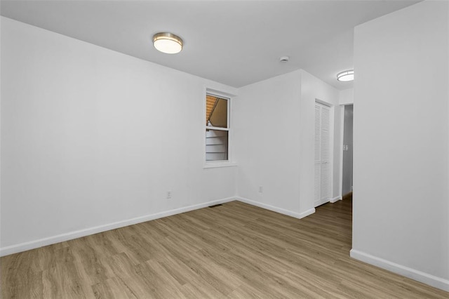 5337 Arsenal St, Saint Louis, MO 63139 - unfurnished room featuring light wood finished floors and baseboards