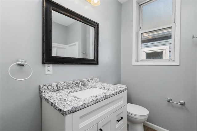 5337 Arsenal St, Saint Louis, MO 63139 - bathroom with vanity and toilet