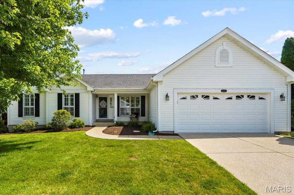 16350 Black Cherry Dr, Wildwood, MO 63040 - single story home featuring driveway, a front lawn, and a garage