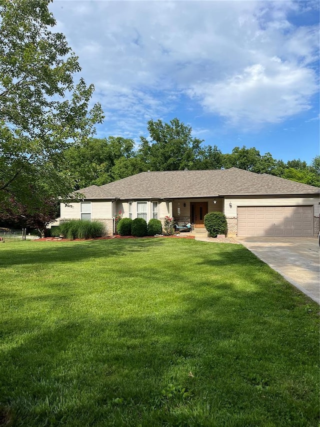 12 Hillside Ct, Wentzville, MO 63385 - ranch-style home with a garage, concrete driveway, a front yard, covered porch, and brick siding