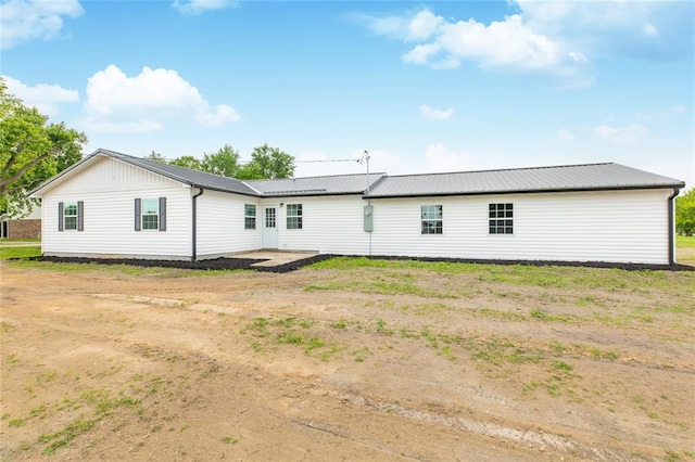 702 E Warren St, Bunker Hill, IL 62014 - rear view of property featuring metal roof