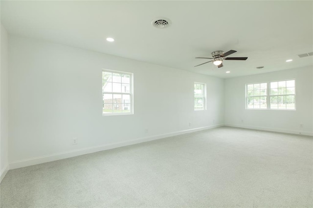 702 E Warren St, Bunker Hill, IL 62014 - empty room with baseboards, ceiling fan, light colored carpet, and recessed lighting