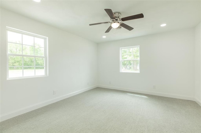 702 E Warren St, Bunker Hill, IL 62014 - empty room with recessed lighting, light carpet, baseboards, and a ceiling fan