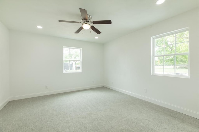 702 E Warren St, Bunker Hill, IL 62014 - spare room featuring recessed lighting, baseboards, light carpet, and ceiling fan