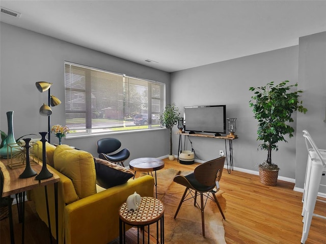 8668 Engler Ave, St John, MO 63114 - sitting room featuring wood finished floors and baseboards