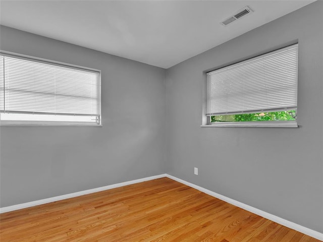 8668 Engler Ave, St John, MO 63114 - unfurnished room with baseboards and light wood-type flooring