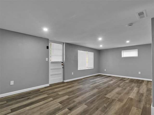 8668 Engler Ave, St John, MO 63114 - empty room featuring dark wood finished floors, recessed lighting, baseboards, and a smoke detector
