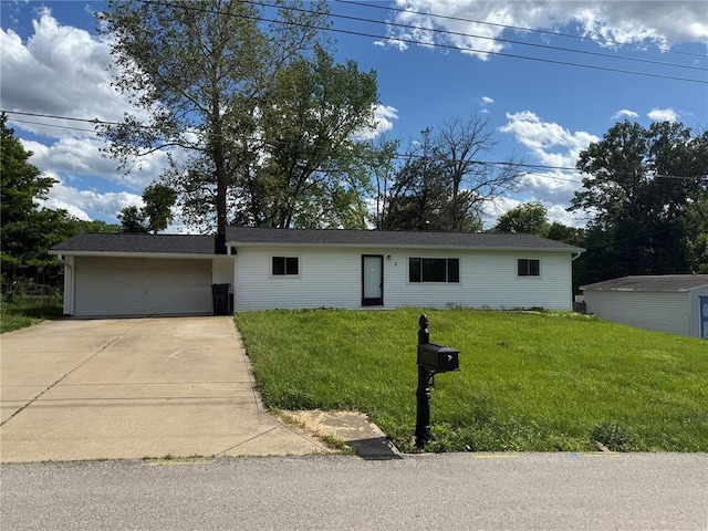 3 Airline Dr, Saint Charles, MO 63304 - ranch-style house featuring a front lawn, concrete driveway, and a garage
