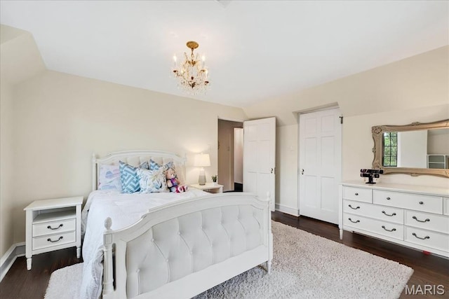 32 Woodoaks Trl, Ladue, MO 63124 - bedroom with a chandelier and dark wood-type flooring