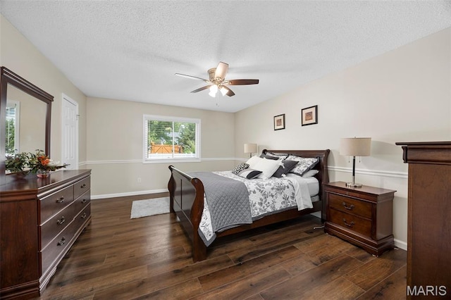 4163 Attleboro Ct, Saint Charles, MO 63304 - bedroom with dark wood-style floors, a textured ceiling, baseboards, and ceiling fan