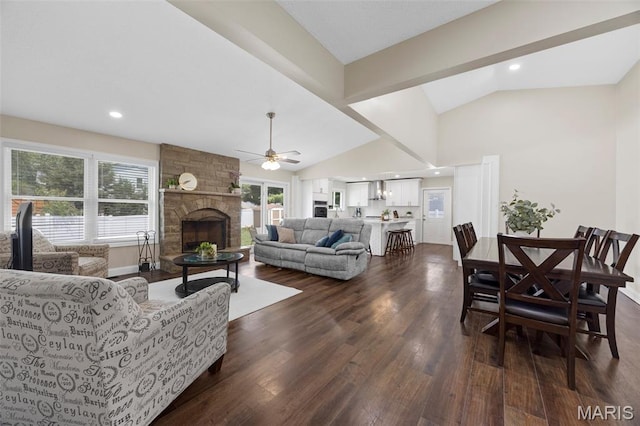 4163 Attleboro Ct, Saint Charles, MO 63304 - living area featuring ceiling fan, vaulted ceiling, dark wood finished floors, a stone fireplace, and recessed lighting