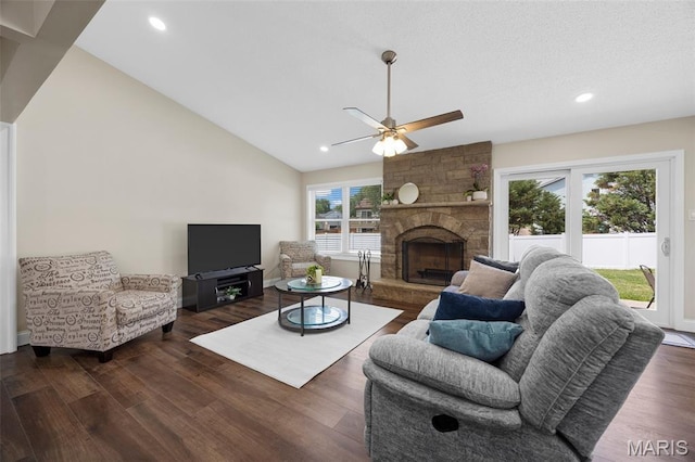 4163 Attleboro Ct, Saint Charles, MO 63304 - living area featuring dark wood-style flooring, ceiling fan, recessed lighting, vaulted ceiling, and a fireplace