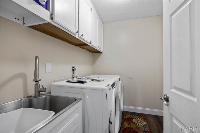 4163 Attleboro Ct, Saint Charles, MO 63304 - laundry area featuring cabinet space, washer and clothes dryer, and baseboards