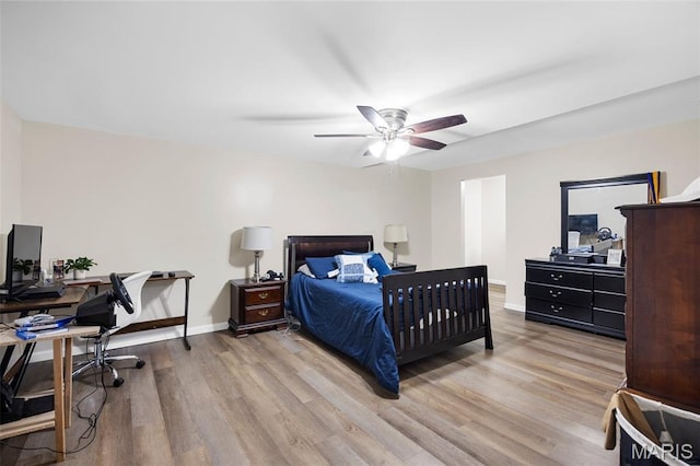 4163 Attleboro Ct, Saint Charles, MO 63304 - bedroom featuring wood finished floors, an office area, baseboards, and ceiling fan