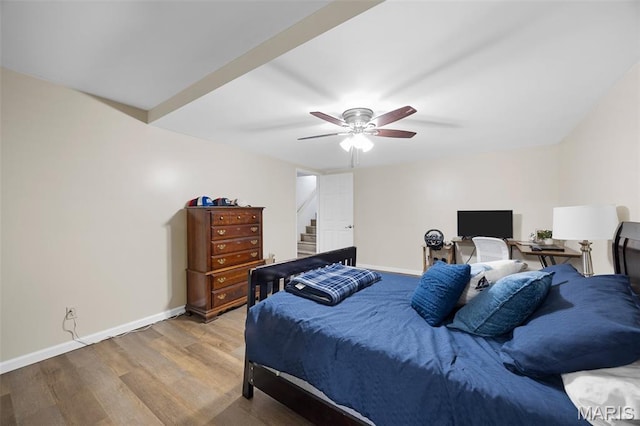 4163 Attleboro Ct, Saint Charles, MO 63304 - bedroom with wood finished floors, baseboards, ceiling fan, and an office area