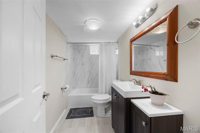 4163 Attleboro Ct, Saint Charles, MO 63304 - full bathroom featuring vanity, shower / tub combo, toilet, and baseboards