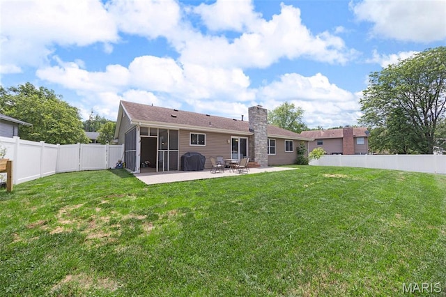 4163 Attleboro Ct, Saint Charles, MO 63304 - rear view of house featuring a patio area, a chimney, and a sunroom