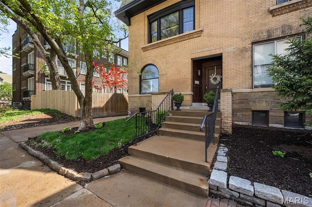 232 N Newstead Ave, Saint Louis, MO 63108 - doorway to property with brick siding