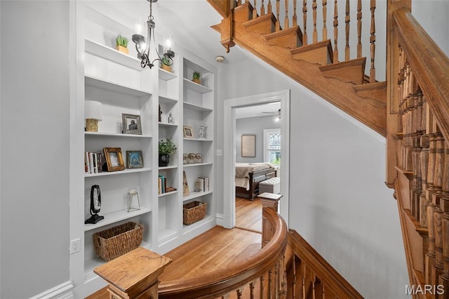 232 N Newstead Ave, Saint Louis, MO 63108 - hall with wood finished floors and stairs