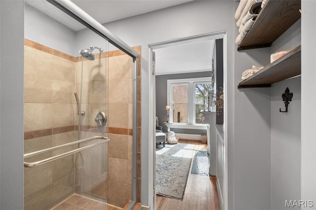 232 N Newstead Ave, Saint Louis, MO 63108 - bathroom featuring a shower stall and wood finished floors