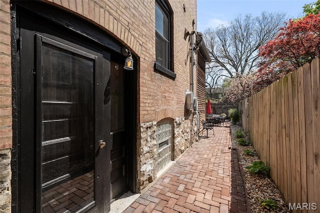 232 N Newstead Ave, Saint Louis, MO 63108 - entrance to property featuring stone siding and brick siding