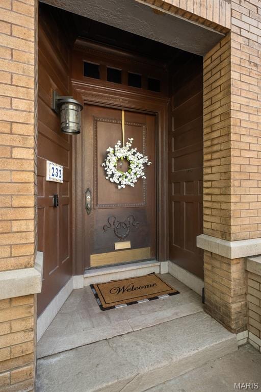 232 N Newstead Ave, Saint Louis, MO 63108 - property entrance featuring brick siding