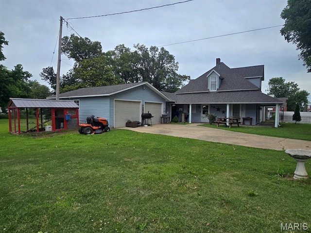 346 S Locust St, Dexter, MO 63841 - view of front of home featuring a front lawn, roof with shingles, covered porch, a chimney, and driveway