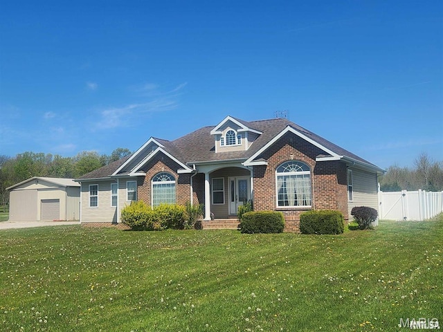 8847 State Route 14th Hwy, Duquoin, IL 62832 - view of front facade with brick siding, an outbuilding, covered porch, and a gate