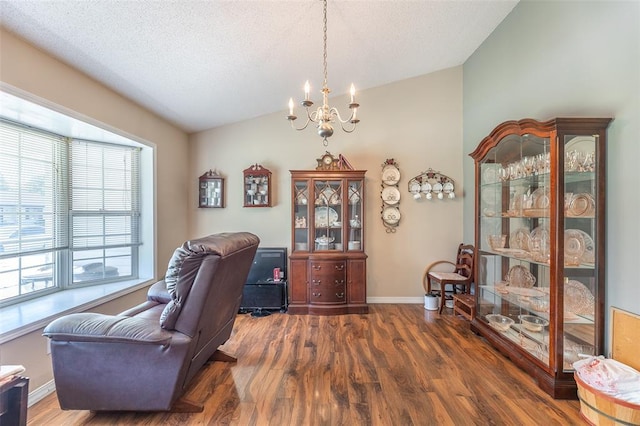 2865 Vaughn Ave, Poplar Bluff, MO 63901 - home office featuring a chandelier, wood finished floors, vaulted ceiling, baseboards, and a textured ceiling