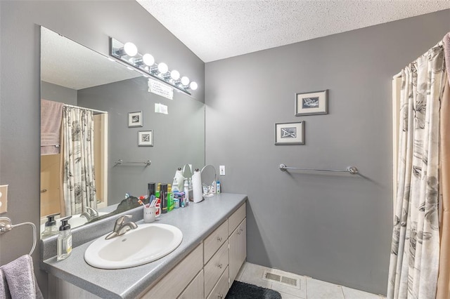 2865 Vaughn Ave, Poplar Bluff, MO 63901 - full bathroom with vanity, tile patterned floors, a textured ceiling, and curtained shower