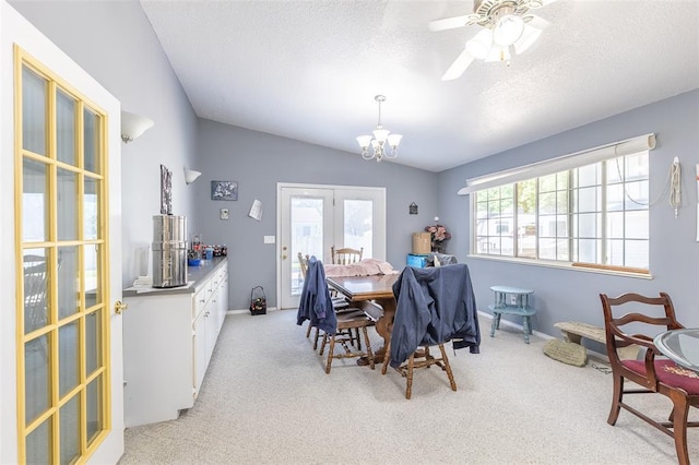 2865 Vaughn Ave, Poplar Bluff, MO 63901 - dining area with lofted ceiling, light colored carpet, a chandelier, ceiling fan, and a textured ceiling