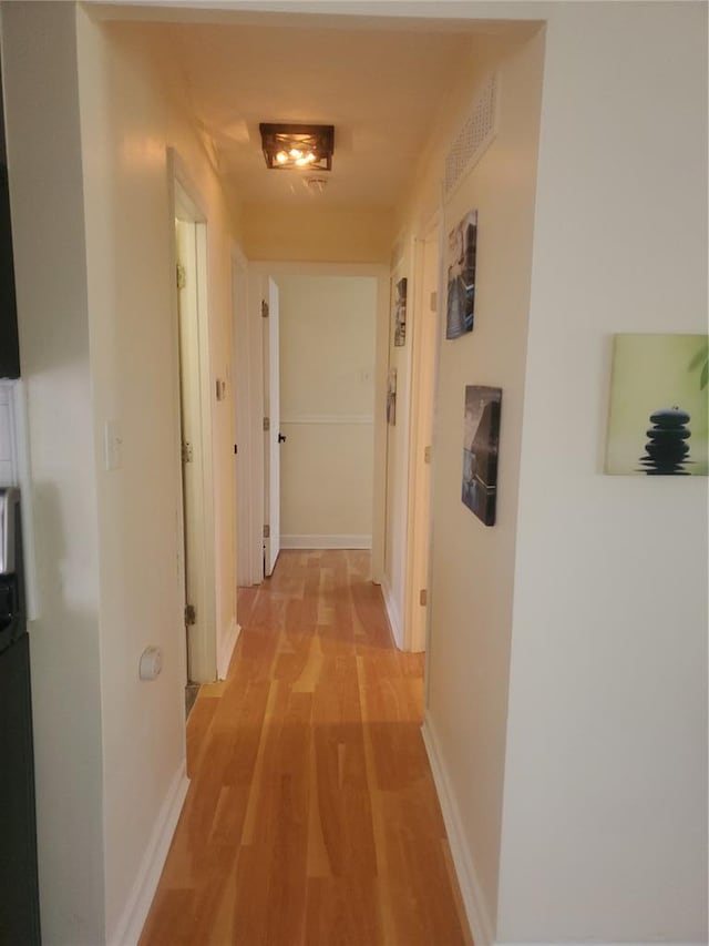1 Wild Deer Ln, Saint Peters, MO 63376 - hallway featuring light wood finished floors and baseboards