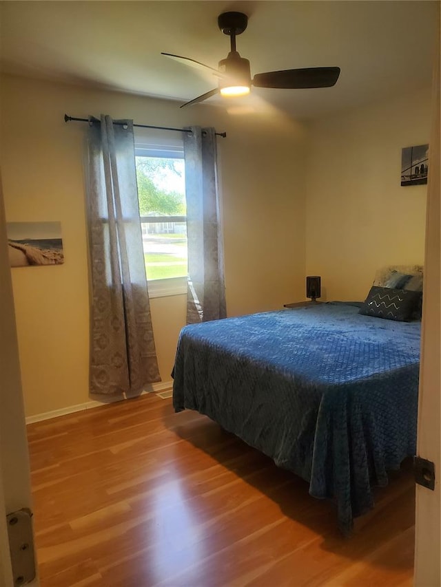 1 Wild Deer Ln, Saint Peters, MO 63376 - bedroom featuring wood finished floors, ceiling fan, and baseboards