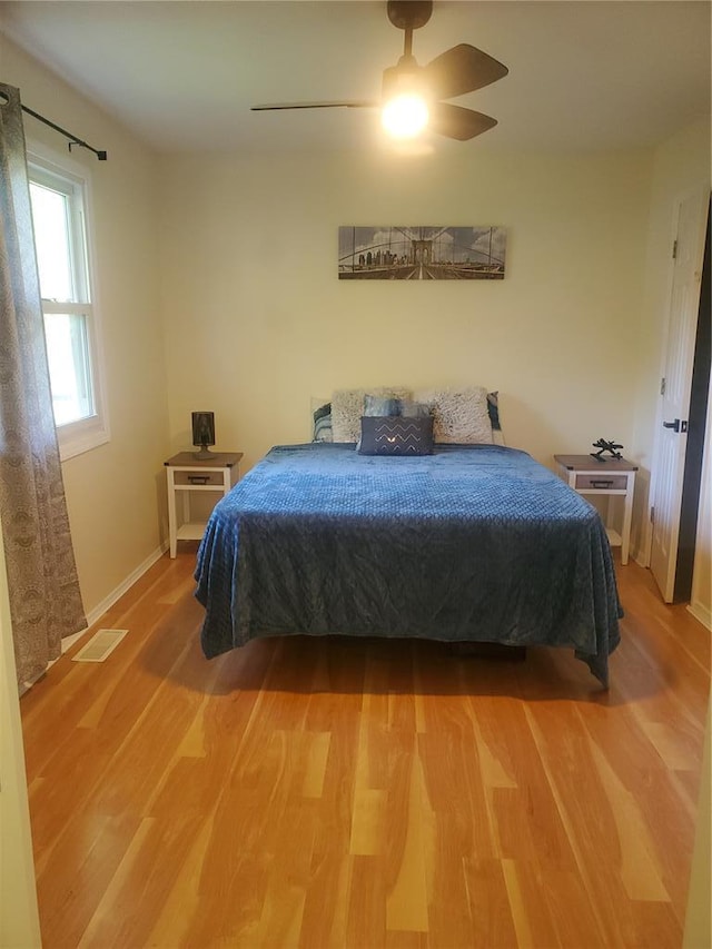1 Wild Deer Ln, Saint Peters, MO 63376 - bedroom with light wood-type flooring, baseboards, and ceiling fan