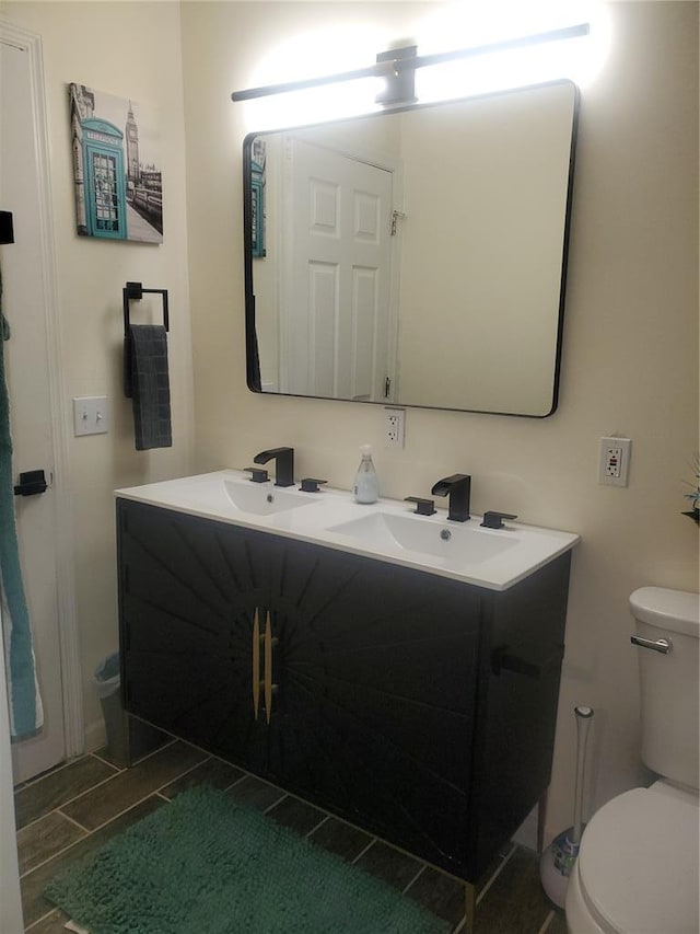 1 Wild Deer Ln, Saint Peters, MO 63376 - bathroom with double vanity and toilet
