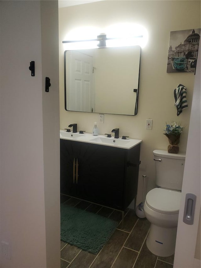 1 Wild Deer Ln, Saint Peters, MO 63376 - bathroom featuring toilet and double vanity