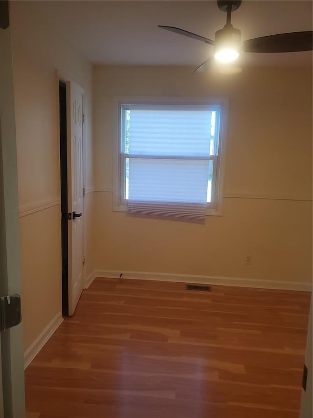 1 Wild Deer Ln, Saint Peters, MO 63376 - empty room featuring a ceiling fan, light wood-type flooring, and baseboards