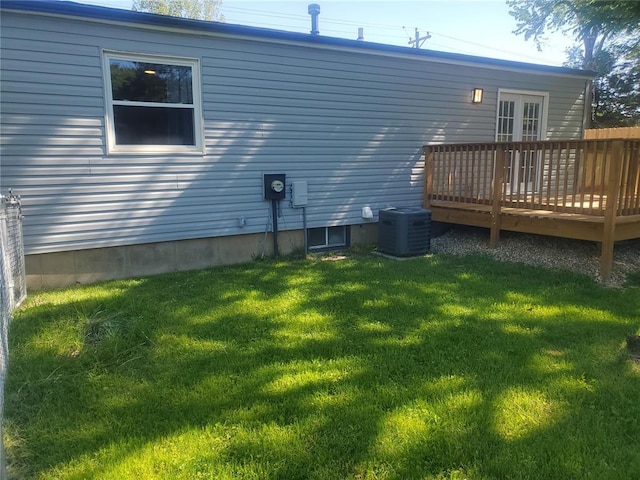 1 Wild Deer Ln, Saint Peters, MO 63376 - rear view of property with a wooden deck, central AC unit, and a lawn