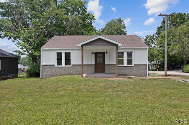 812 Richeson Rd, Potosi, MO 63664 - view of front of house featuring board and batten siding, a front lawn, and roof with shingles