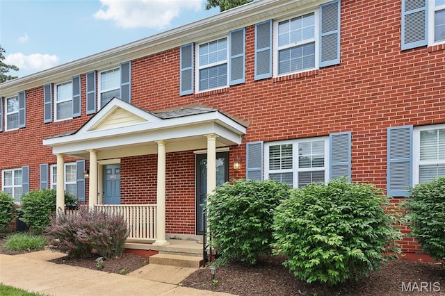 8854 Flamingo Ct, Saint Louis, MO 63144 - multi unit property with brick siding and covered porch