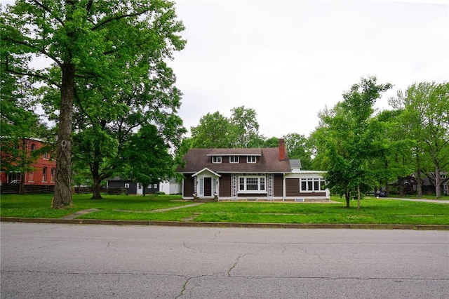 301 S Meramec St, St James, MO 65559 - view of front of property featuring a chimney and a front yard