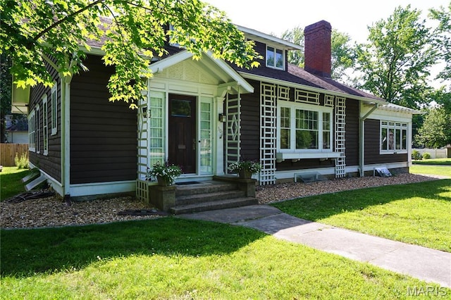 301 S Meramec St, St James, MO 65559 - view of front of house with a chimney and a front yard