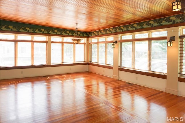 301 S Meramec St, St James, MO 65559 - unfurnished sunroom with wood finished floors