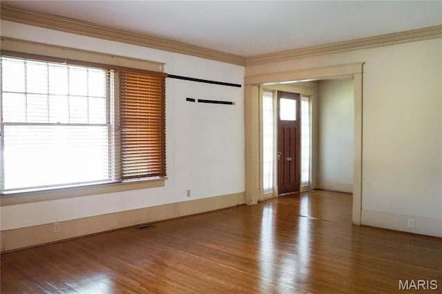 301 S Meramec St, St James, MO 65559 - spare room with wood finished floors and ornamental molding
